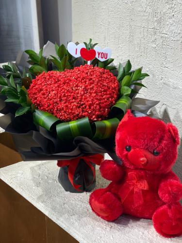 Heart bouquet with teddy bear