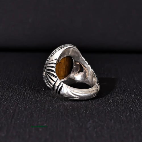 خاتم فضة رجالي عيار 990 متوج بحجر عين النمر