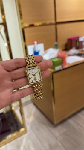 ساعه توري بورش لون ذهبي