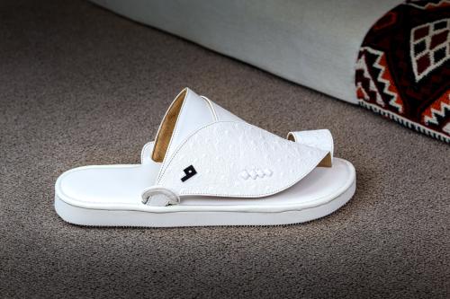 جلد نعام ابيض (يفضل طلب مقاس اكبر)