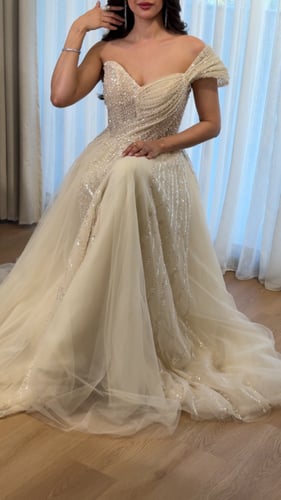 فستان سهرة تل بتطريز