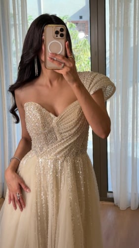 فستان سهرة تل بتطريز