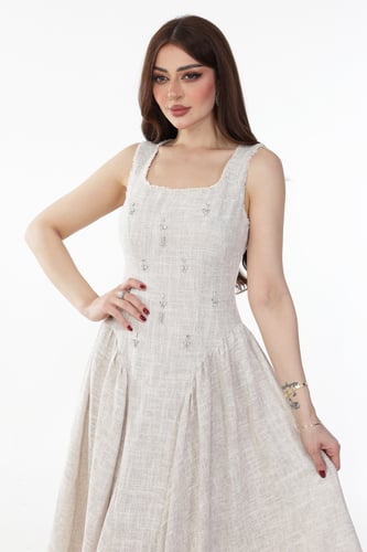 فستان كتان بكسرات جانبيه انيقة