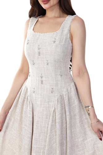 فستان كتان بكسرات جانبيه انيقة