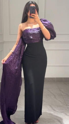 فستان سهرة بدلعة على الجانب