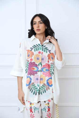 بلوزة واسعة غير متماثلة الطول