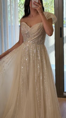 فستان سهرة تل بتطريز