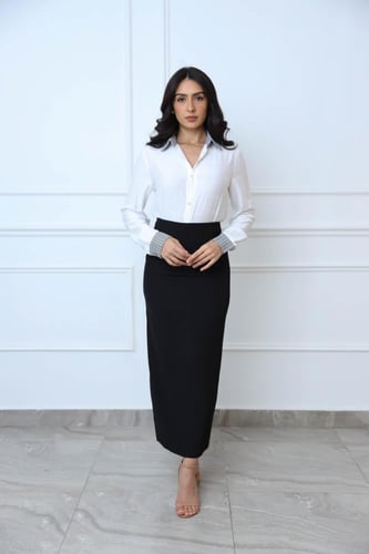 بلوزة بازرار مذهبة