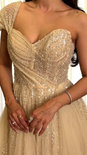 فستان سهرة تل بتطريز