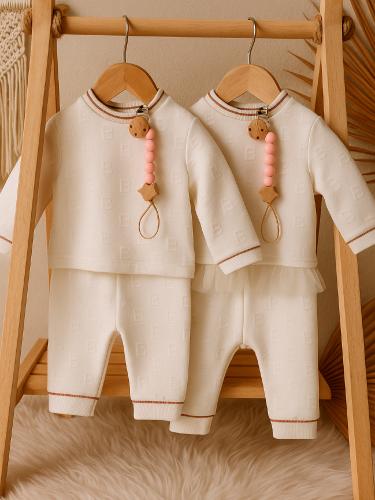 هدية طقم فاخر لتوأم حديثي الولادة بنات من تيد بيكر...