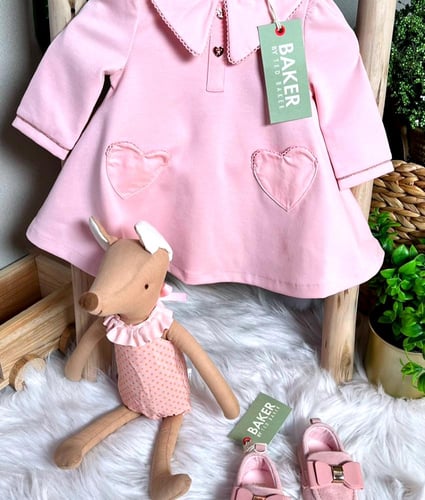 هدية مواليد بناتي من تيد بيكر جميلة جدا