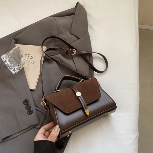 حقيبة يد صناعية أنيقة مع حزام قابل للتعديل