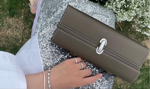 حقيبة يد نسائية بمقابض علوية