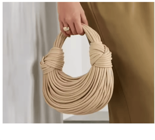 شنطة يد للنساء بلون ذهبي فاخر منسوجة يدويا