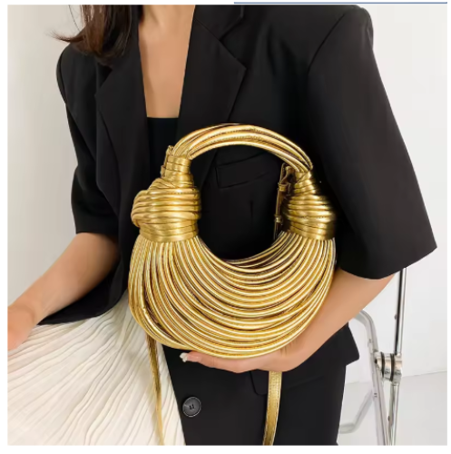 شنطة يد للنساء بلون ذهبي فاخر منسوجة يدويا