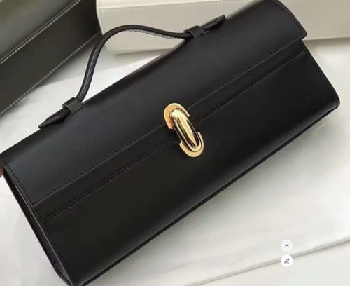 حقيبة يد نسائية بمقابض علوية