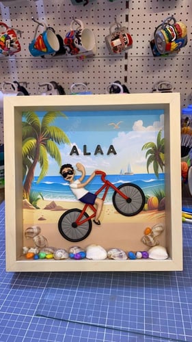 برواز مقاس 27 * 27 شاب يحب البحر والدراجة تصميم حس...