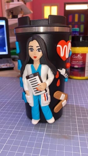 ممرضة كوب حافظ للحرارة