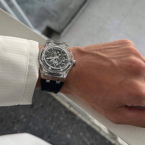 ساعة شفافة سوار اسود مينا رمادي