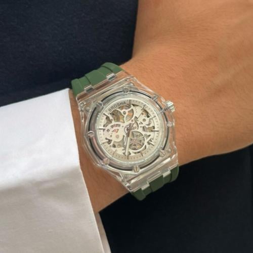 ساعة شفافة سوار اخضر