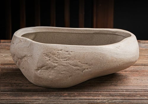 وعاء زهور من السيراميك المعتق