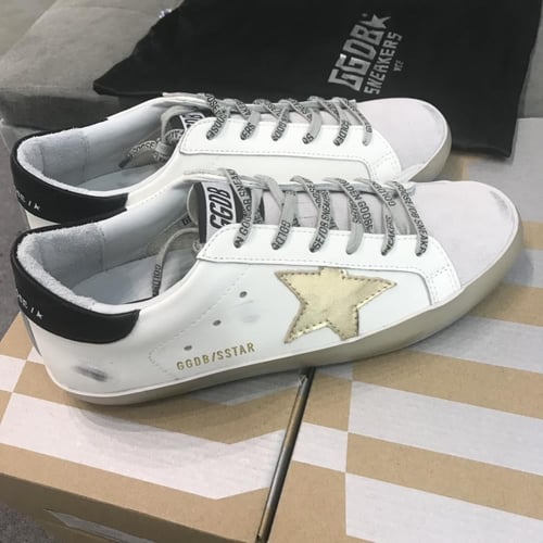 Golden Goose ( خلفيه اسود )