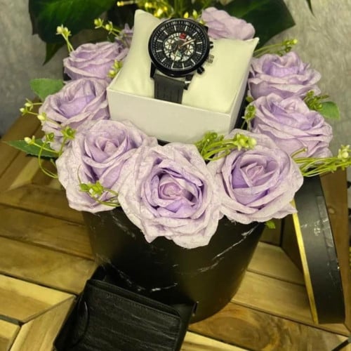 بوكس مع ورد شبيه الطبيعي +ساعه رجاليه +محفظه رجالي...