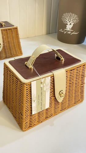 حقيبة خوص بالجلد