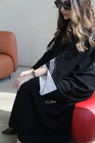 عباية قماش لمياء اندنوسي كم شك