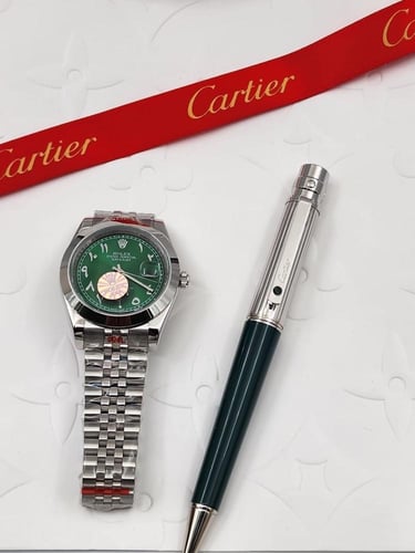 ساعة رولكس مع قلم كارتير