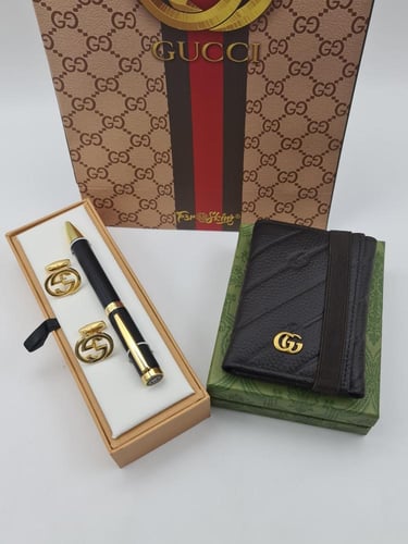 قلم وكبك ومحفظه قوتشي