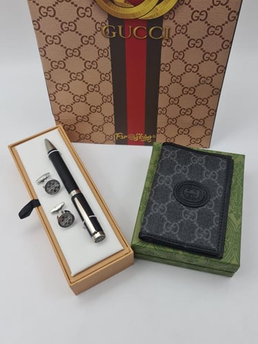 قلم وكبك ومحفظه قوتشي