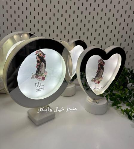مرايا مضيئه تخرج مع اسم (12) حبه