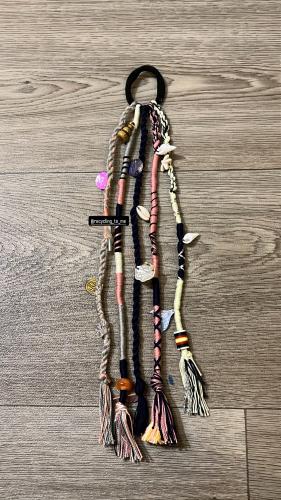 ربطة الشعر بالخيوط