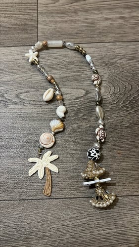 تعليقة الشنطه بالخرز