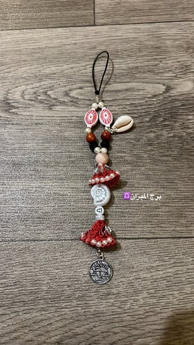 تعليقة الجوال بالبرج