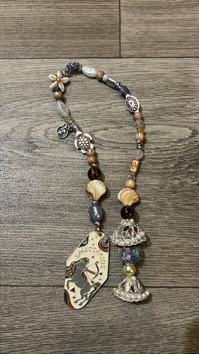 تعليقة الشنطه برج القوس