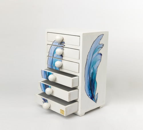 صندوق مٌزيّن بشكل الريشة