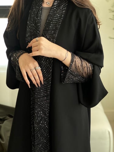 عبايه اسود بتفاصيل تل