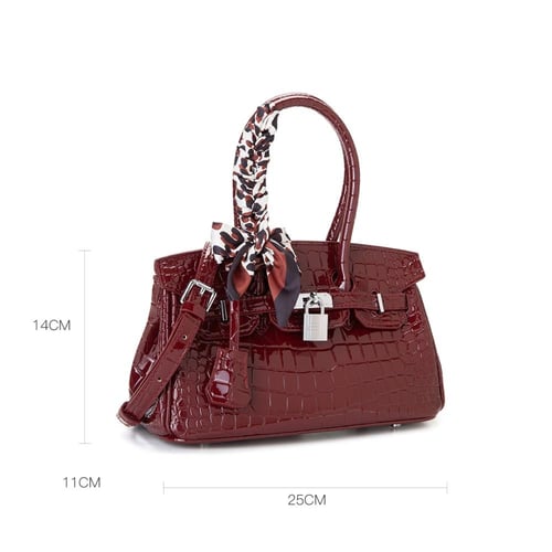 شنطة نسائية لون عنابي من لادون