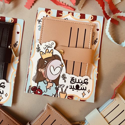 توزيعات محفظة جلدية ( نسائي/رجالي)