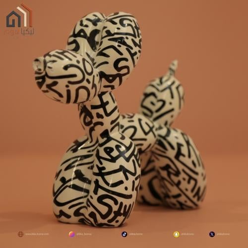 تحفة على شكل كلب باللون الابيض