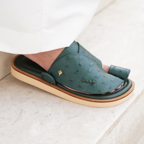 جلد نعام اخضر غامق مع ربل بيج