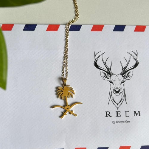 تعليقة السيفين والنخلة"ذهبي"