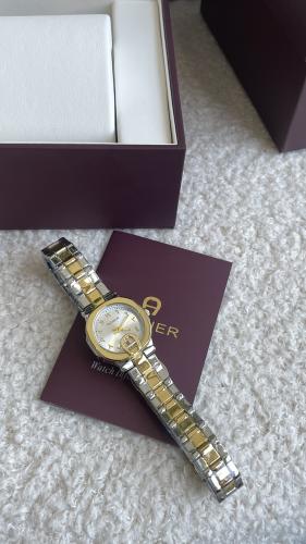 ساعة اقنر نسائيه ذهبي مع فضي شامل ملحقاته