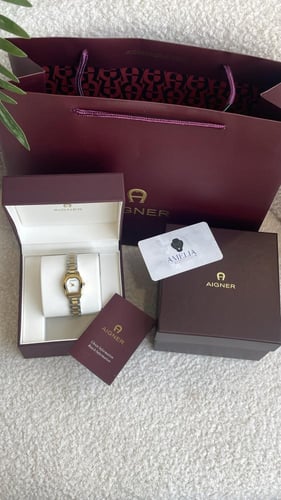 ساعة اقنر نسائيه ذهبي مع فضي شامل ملحقاته