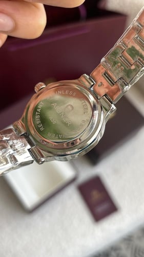 ساعة اقنر نسائيه فضي شامل ملحقاته