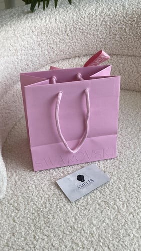 كيس وردي سوارفسكي وسط