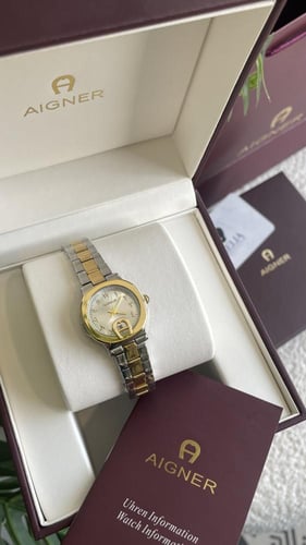 ساعة اقنر نسائيه ذهبي مع فضي شامل ملحقاته