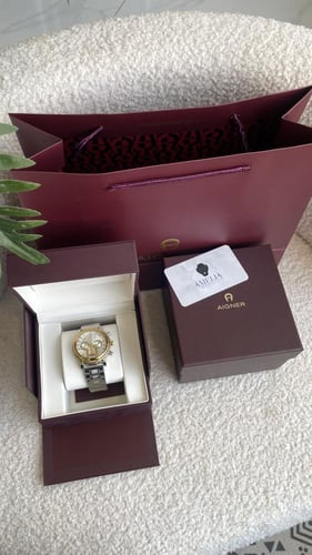 ساعة اقنر رجالي فضي مع ذهبي شامل ملحقاته